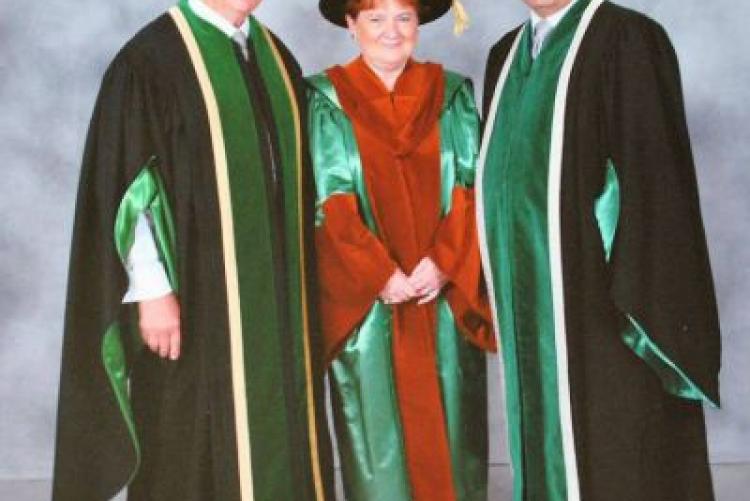 Pat Mella (centre) with her brother Don McDougall (left) and UPEI President Alaa Abd-El-Aziz 