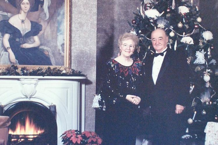 Hon. Marion L. Reid as Lieutenant Governor and her husband Lea Reid in the parlour at Government House at Christmas 
