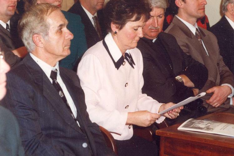 Pat Mella sitting in the Legislative Assembly with her husband Angelo Mella