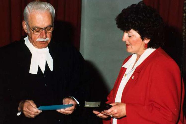 Nancy Guptill at a swearing-in ceremony with Chief Justice ? 