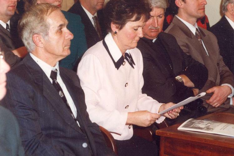 Pat Mella and her husband Angelo (left) on opening day of a 1993 session of the Legislative Assembly / P. Mella collection Pat Mella sitting in the Legislative Assembly with her husband Angelo Mella