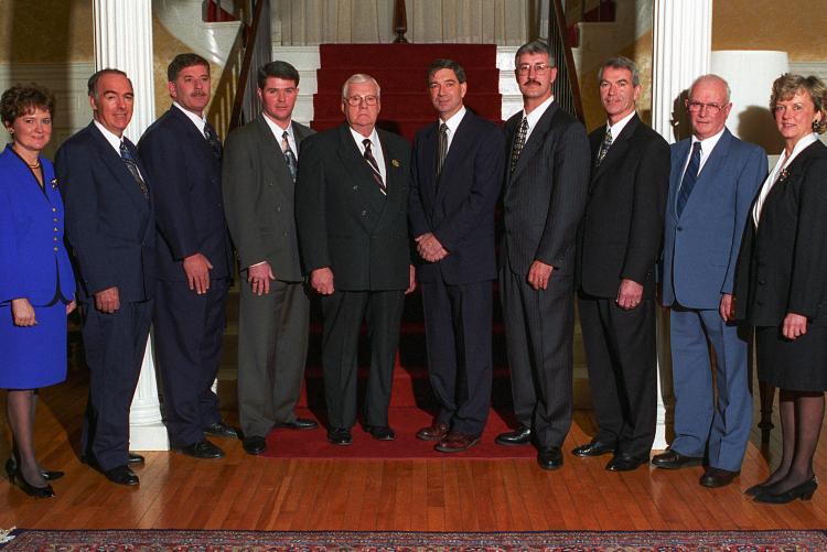 Mella (left) pictured with Premier Pat Binns and the PC cabinet at Government House, 1996 /P. Mella collection Premier Pat Binns and cabinet at Government House
